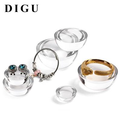 China DIGU Modern Simple New Arrival Organic Glass Acrylic Transparent Jewelry Prop Shelf Pallet Base Ring Display Trinket for sale