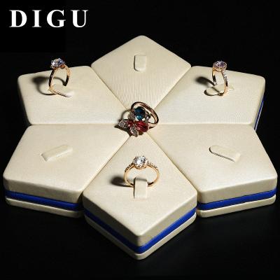 China Jewelry Display DIGU Ring Jewelery Jewelry Window Decoration Tray Counter Props PU Leather Ring Display Stand for sale