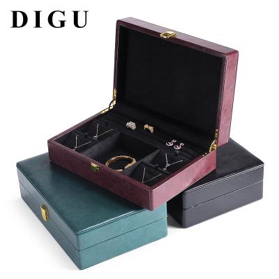 China Luxury DIGU Luxury PU Ring Earrings Leather Multi-Function Bracelet with Lock Jewelry Set Box Tray Jewelry Display Case for sale