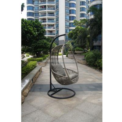 China Modern Plastic Rattan Swing With Armrest Aluminum Rattan Hanging Chair Rattan Basket Egg Swing for sale