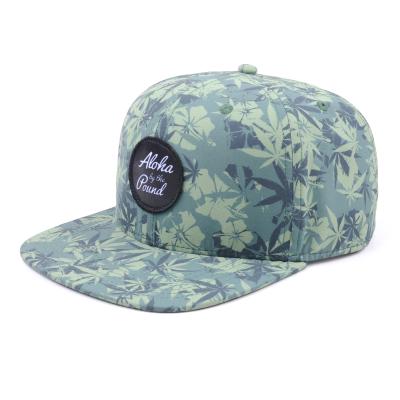 China OEM JOINT Design Woven Patch Weed Printed Snapback Cap Cap for sale