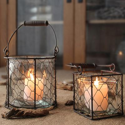 China Home Decoration Nordic Wrought Iron Lantern Candle Holder With Round Glass for sale