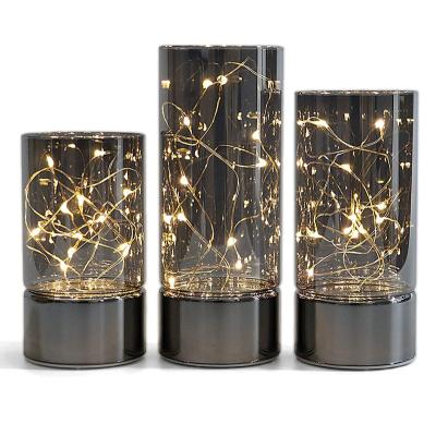 China LED Fairy Lights Glass Cylinder Glass Lamp With Metal Base for sale