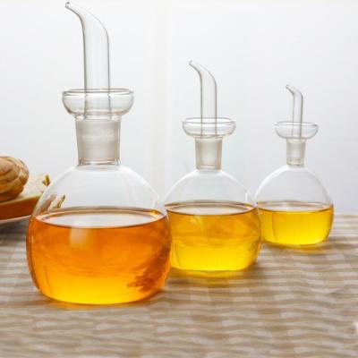 China Viable Round 250ml Condiment Serve Olive Oil Vinegar Dispenser Glass Bottle for sale