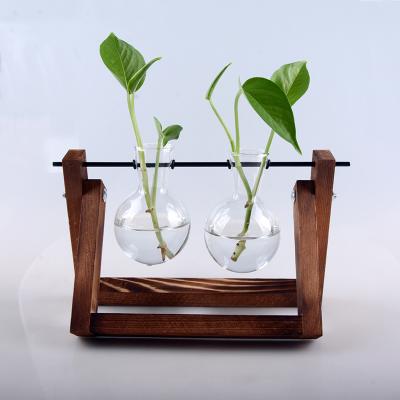 China Europe Medium Creative Hydroponic Plant Vase Wooden Frame Clear Glass Vase for sale