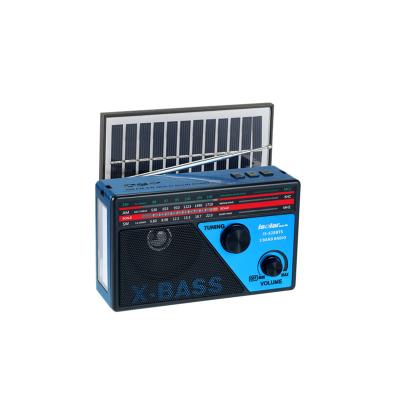 China Portable mini home fm AM switch solar powered radios with speaker and LED light portables receiver support USB/TF music player for sale