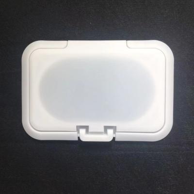 China Bottles Wet PP Tissue Lid Box Flip Top Cap Tissue Cover for sale