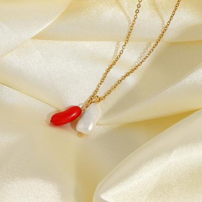 China FASHIONABLE European Elegant 18K Gold Plated Coral Necklace Women Stainless Steel Red Freshwater Pearl Pendant Necklace for sale