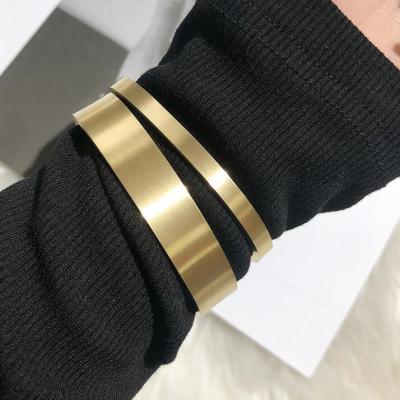 China Trendy wholesale fashion simple 18k gold plated 316L stainless steel waterproof women slap bangle bracelet for sale