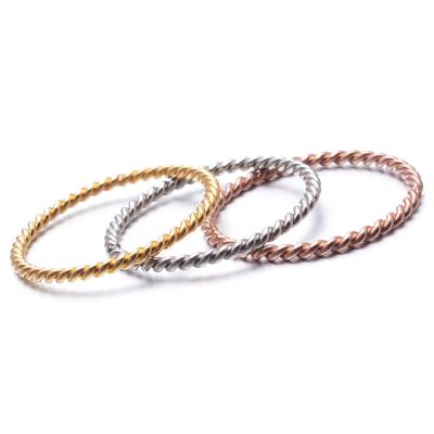 China Stainless Steel Twist Ring Fashion LA MODE 18k French Simple Gold Plated Spiral Pattern Ring For Women for sale