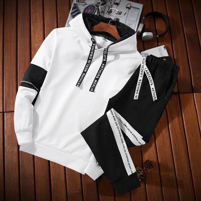 China QUICK DRY Tracksuit Gym Embossed Hoodie Mens Sweatsuit Unisex Jogger Tracksuit For MEN for sale