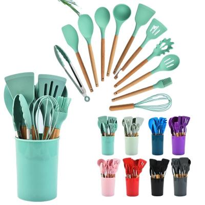 China Sustainable Heat Resistance 12 Pieces Nonstick Wooden Handle and Silicone Kitchen Cooking Tools Kitchen Utensils Set with Rack for Wholesale for sale