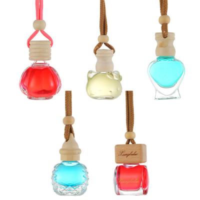 China 2021 New Design Gift Cute Perfume Bottle Car Pendant Various Shapes, Customized Portable Mini Glass Perfume Empty for sale