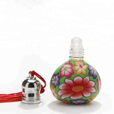 China New Soft Ceramic Air Freshener Empty Bottle Perfume Pearl Bottle Tassel Dispensing Ball for sale