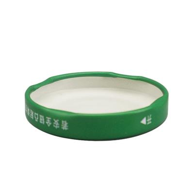 China Non Spill Wholesale To Custom Design 58mm Green Tinplate Metal Hook Cap Glass Bottle Jar Lid for sale