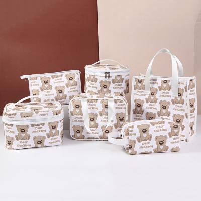 China Wholesale Fashionable Cute Cartoon Pattern Small Cosmetic Portable Bag Vintage Factory Design Leather Cosmetic Bag for sale