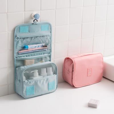 China Minimalist Clear Makeup Organizer Waterproof Large Toiletry Travel Hanging Bag with Mesh Pockets for sale