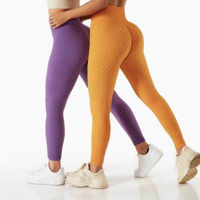 China Breathable yoga supplies new jacquard running outdoor fitness leggings butt wholesale women yoga lifting pants for sale