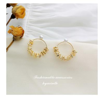 China BOHEMIA fashion pearl earrings metal cold wind earrings simple and soft earrings for sale