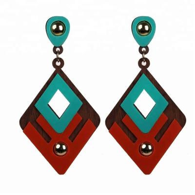 China Xus Fashionable African Wooden Exaggerated Ethnic Tribal Wooden Earrings Resin Diamond Ladies Jewelry Stud Earrings for sale