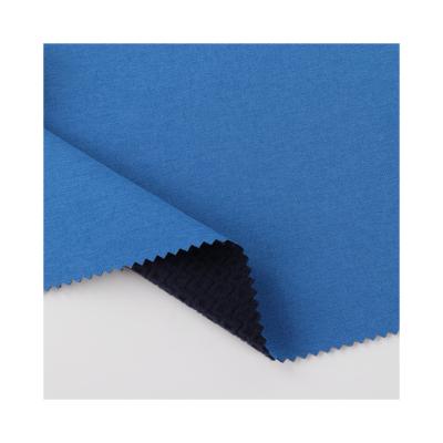 China Downproof Waterproof Polyester Fabric Melange 4 Way Stretch Cationic Fabric Softshell Fabric For Dresses for sale