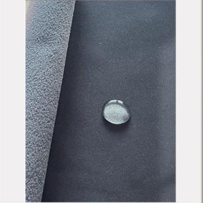 China Waterproof Wholesale Warm Keeping Polyester Stretch Twill Fabric Bonded Fleece Uniform Fabric for sale