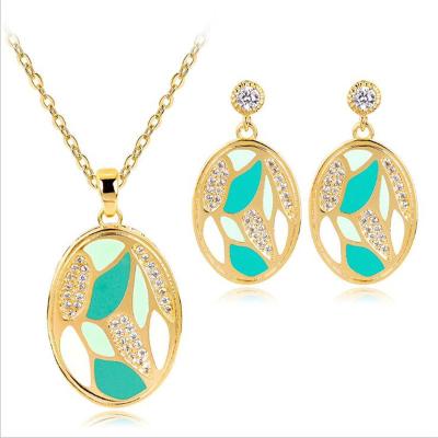 China TRENDY Trendy Gold Plated Green Leaf Flower Design Enamel Jewelry Set With Rhinestone For Women for sale