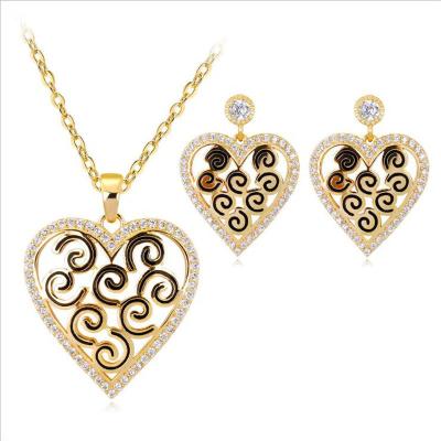 China TRENDY Gold Plated Hollow-out Peach Heart Alloy Pendant Jewelry Set For Women for sale