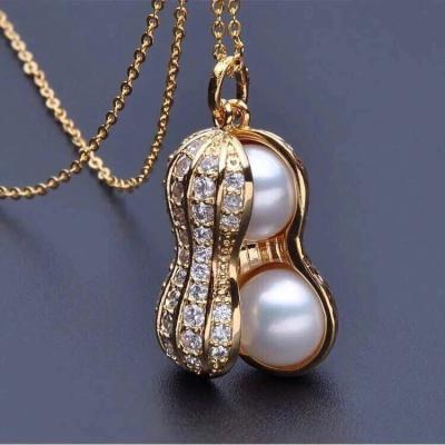 China Newest Fashion Christmas Gift Gold Jewelry Natural Pearl Crystal Peanut Pendant Necklace for sale