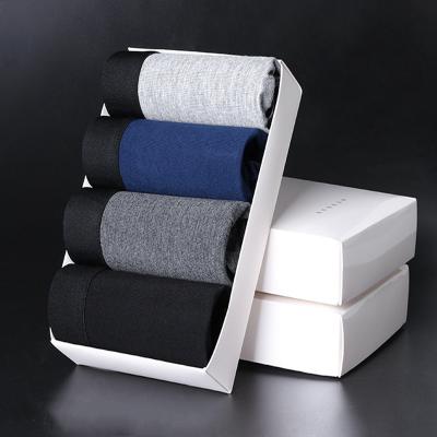 China Cuatro regalos de boxeador para hombres calzoncillos de boxeador confortable y transpirable ropa interior personalizada en venta