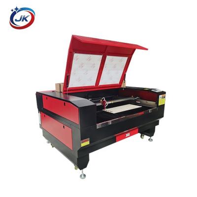 China Programmable CO2 60w 80w 120w Wood Laser Engraving Machine Fabric Laser Cutting Machine MDF Laser for sale