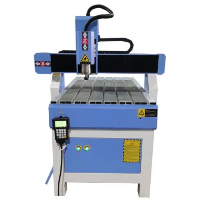 China 2.2KW 6090 Setp Single CNC Engraving and Cutting Machine CNC Router Worm Gear Hotels 3 Axis Router Machine for sale