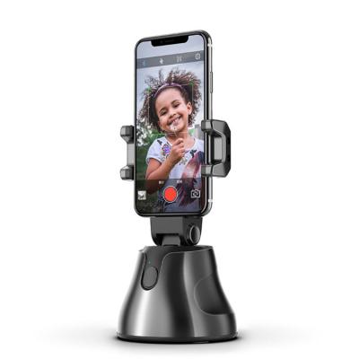 China 360 Degree Rotation Face Object Tracking Selfie Stick Camera Phone Auto Smart Shooting Bracket Apai Geniuses for sale