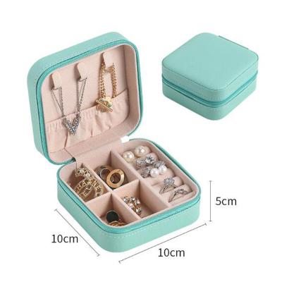 China Handmade Small Ring Earrings Box Jewelry Storage Box Leather Bag Jewelry Storage Portable Jewelry Case for sale