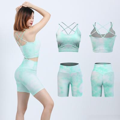 China Breathable Eco-Friendly Recycled Fabric Wear Sustainable Clothing Gym Fitness Yoga Bra Women Clothes 2 Pieces Peel Tight Shorts Set for sale