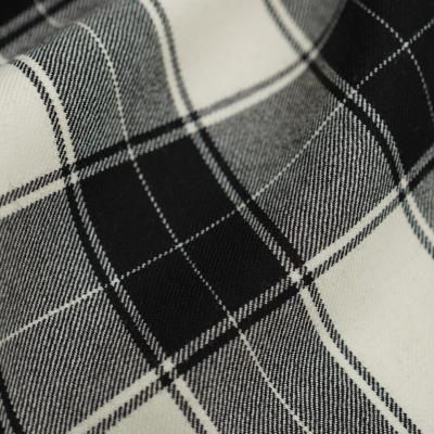 China Stain 100% sustainable wool, black and white plaid, fabric worsted spring and fall suit jacket fashion woolen fabric full for sale