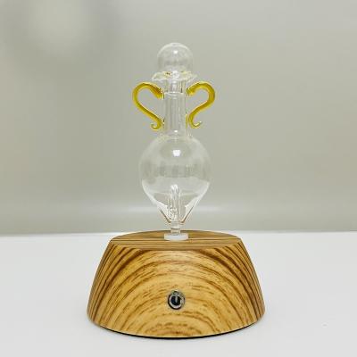 China Household 2022 Wooden Grain Glass Plastic Home Ears Design Aroma Therapy Cooling Diffuser for sale