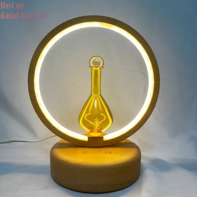 China Household Glass Bottle With LED Warm Light Adjustable Golden Grain Wooden House Nebulizr Diffuser for sale