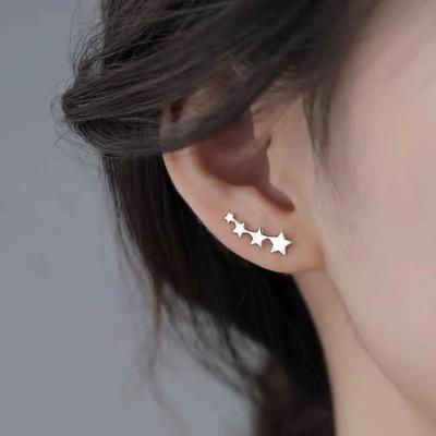 China Best Selling Nickel Free Silver Wholesale Designer Inspired Earrings Star Quartet Crawler Stud Earrings 316l Stainless Steel for sale