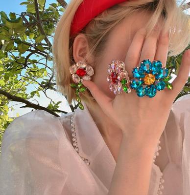 China QIFEI Fashion Exaggerated Color Crystal Flower Ring Large Rhinestone Statement Earrings Jewelry Set for sale