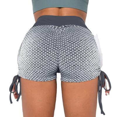 China European and American Jacquard Hip Peach Sweat-Wicking Yoga Pants High Waist Honeycomb Pants Women Fitness Sports Tight Shorts for sale