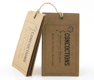 China Biodegradable CMYK 300gsm Kraft Paper Hang Tags For Jeans 50x90mm for sale