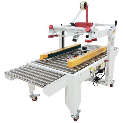 China High Speed ​​Packing Food Ouxin 4050-12 Carton Crates Box Sealer , Semi Automatic Carton Sealer For Widely Use for sale