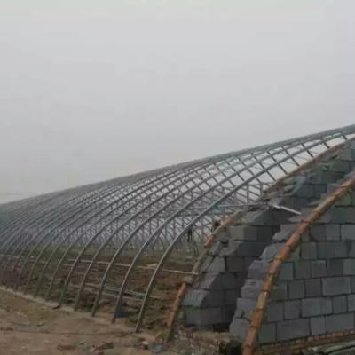 China Best Quality Efficient Commercial Multi-span Glass OEM Winter Hot Selling Solar Greenhouse for sale