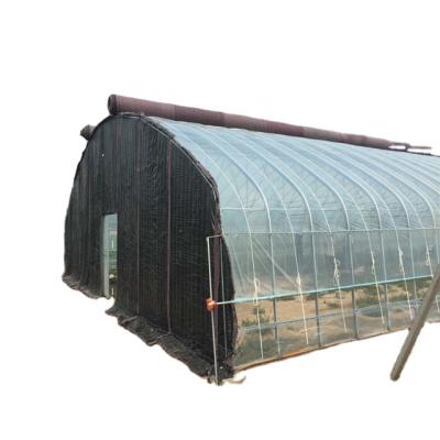 China PE Fiberglass Greenhouse Roofing High Temperature Curved Greenhouse for sale