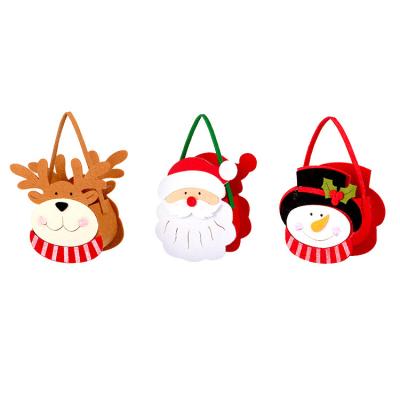 China Environmental Friendly Christmas Classic Items Color Bags Kids Snowman Candy Tote Bags For Gift for sale