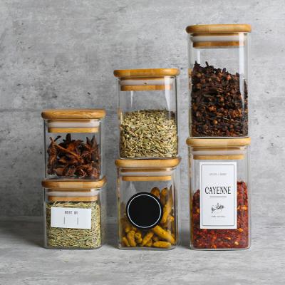 China Borosllicate Multifunctional High Quality Clear Spice Sizes Storage Jar Glass Food Storage With Bamboo Lids for sale