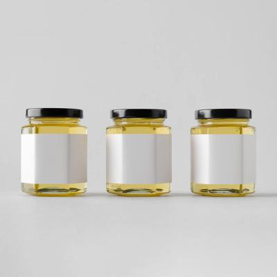 China Morden Design 50Ml 80Ml 100Ml 180Ml 280Ml 380Ml 500Ml Honey Jars Glass Unique Hexagonal Freshness Preservation With Tin Lid for sale