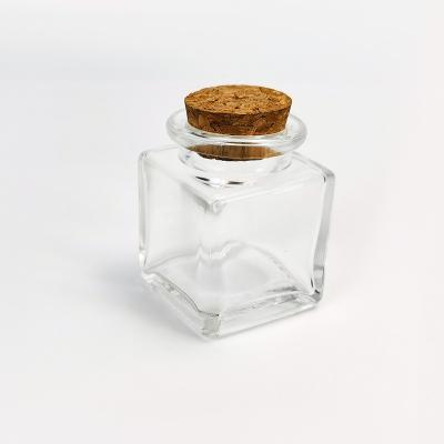 China 240 Viable Classic Small Clear Glass Square Mini Spice Glass Jars 50Ml Jar Set With Cork Lids for sale