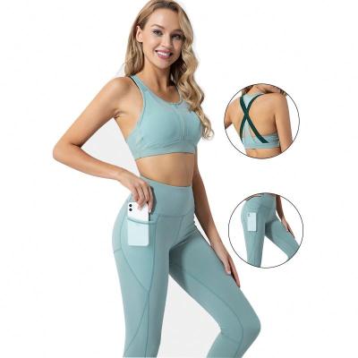 China Breathable 2 PC Workout Set Front Zipper Sports Bra High Waist Yoga Pants Women Yoga Suit With Mesh Pockets Leggings Fitness Yoga Set for sale